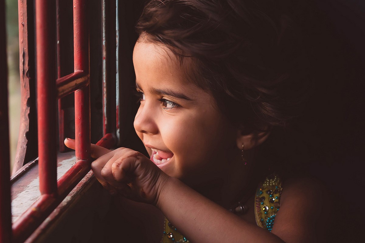 Cute baby in train door 3